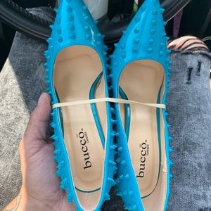 Size 8 women Bucco capensis blue spike pump heels